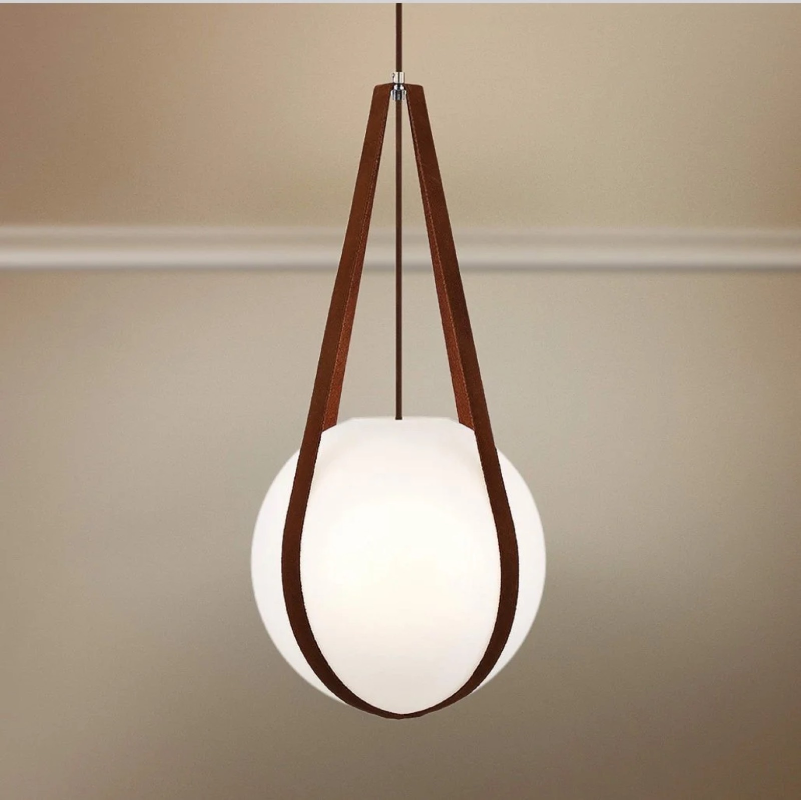A woven pendant light over a styled corner